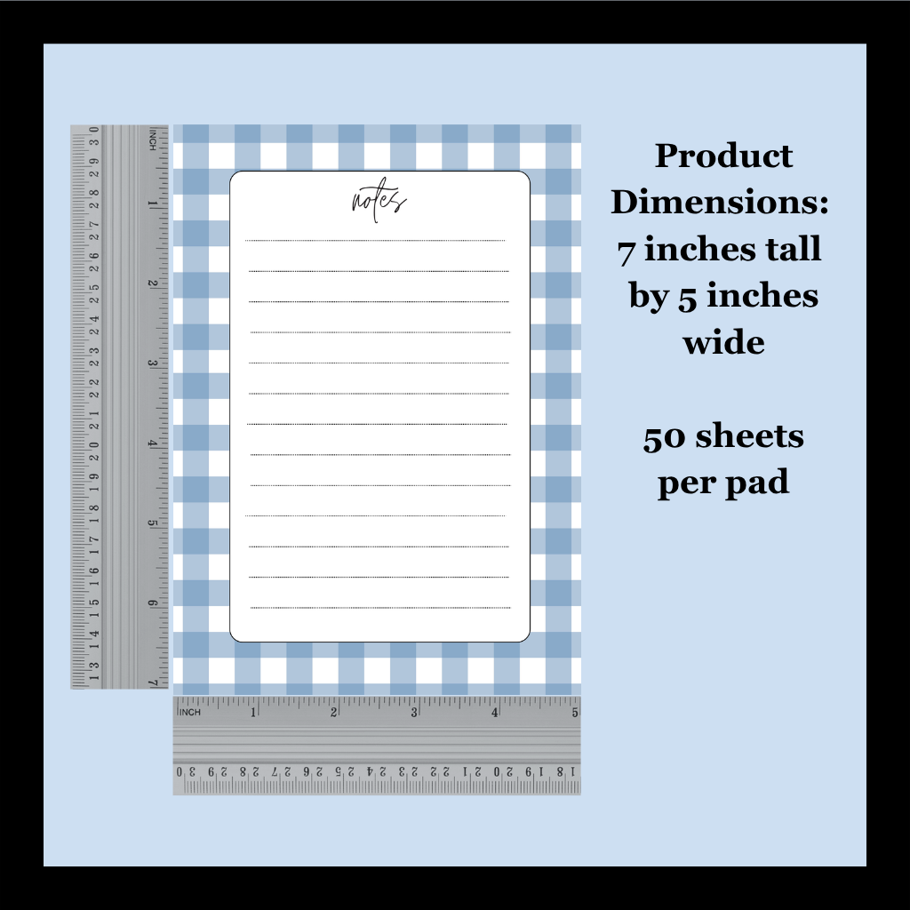 A notepad pad with a light blue and white gingham border and a white lined center page labeled 'notes,' shown with rulers for scale on a pale blue background. Text on the right states product dimensions of 7 inches tall by 5 inches wide and 50 sheets per pad.